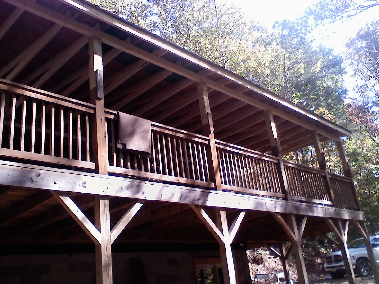 Timber framing under a new elevated porch and deck — Roof Leak Repair in Westlake Village by Roofing Brothers